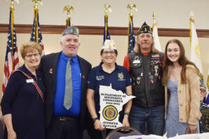 American Legion Auxiliary Department President Mary Kuperus, Sons of American Legion Detachment Commander Tim Weaver, American Legion Department Commander Jennifer Havlick, Director of the Minnesota American Legion Riders Ted Berg and Honorary Department Junior President Sydney Borntrager.