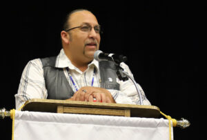 Robert Larson, president of the Lower Sioux Indian Community, greets the Department Convention on July 13.