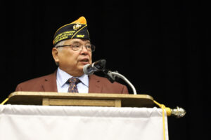DAV Commander Mick Aguirre speaks to the American Legion convention. 