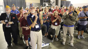 Members of the Minnesota American Legion Family stand and applaud.
