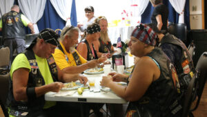 Legion Riders eating breakfast as a group in Pine City.