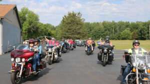 Motorcyclists head out from Pine City Post 51 on July 26.